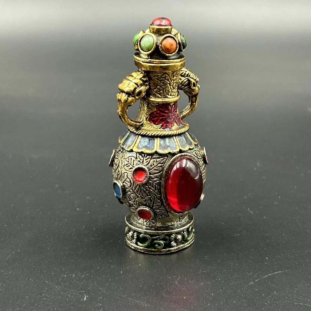 

The Antique Snuff Bottle is Exquisitely Crafted And Has A Beautiful Appearance Which is Worth Showcasing and Collecting