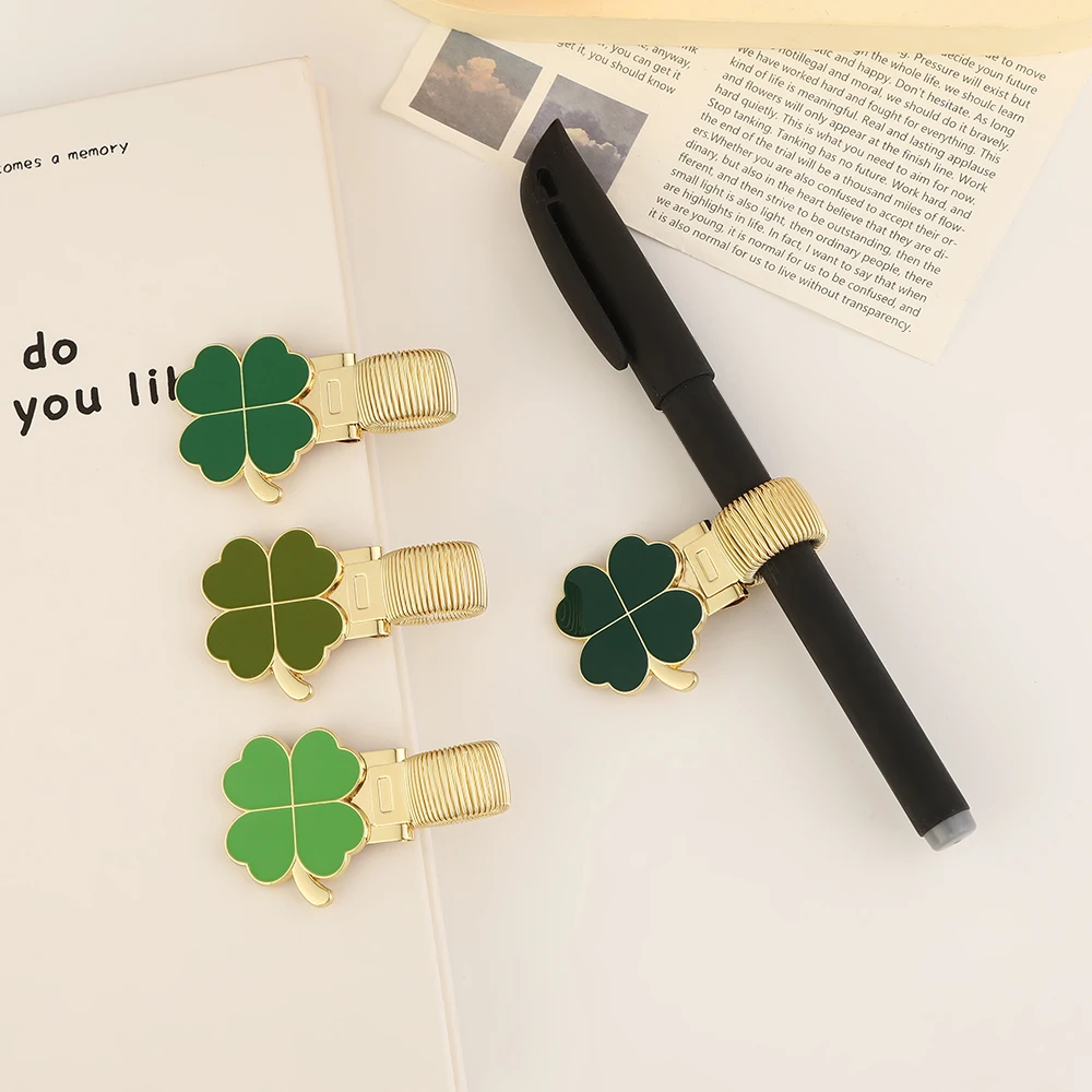 1pc Clover themed metal pen holder with spring metal clip, used for handwriting, notebooks, and student office stationery
