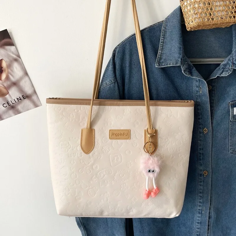 Large-capacity contrasting color handbag women's autumn new embossed fashion versatile shoulder bag commuter tote bag
