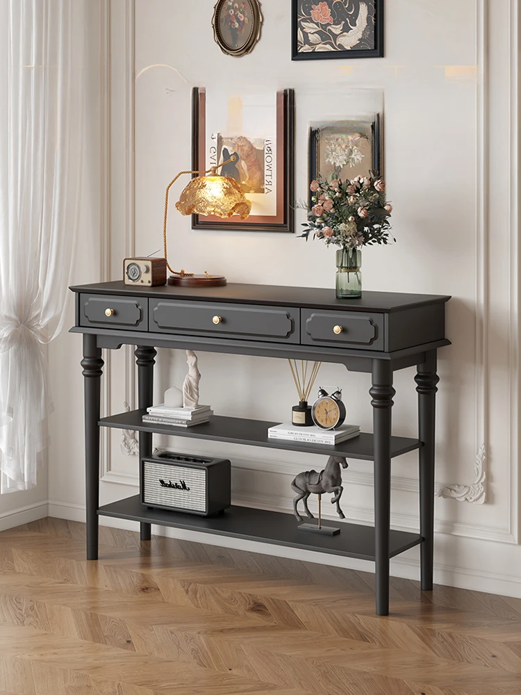 *Black storage table at the entrance