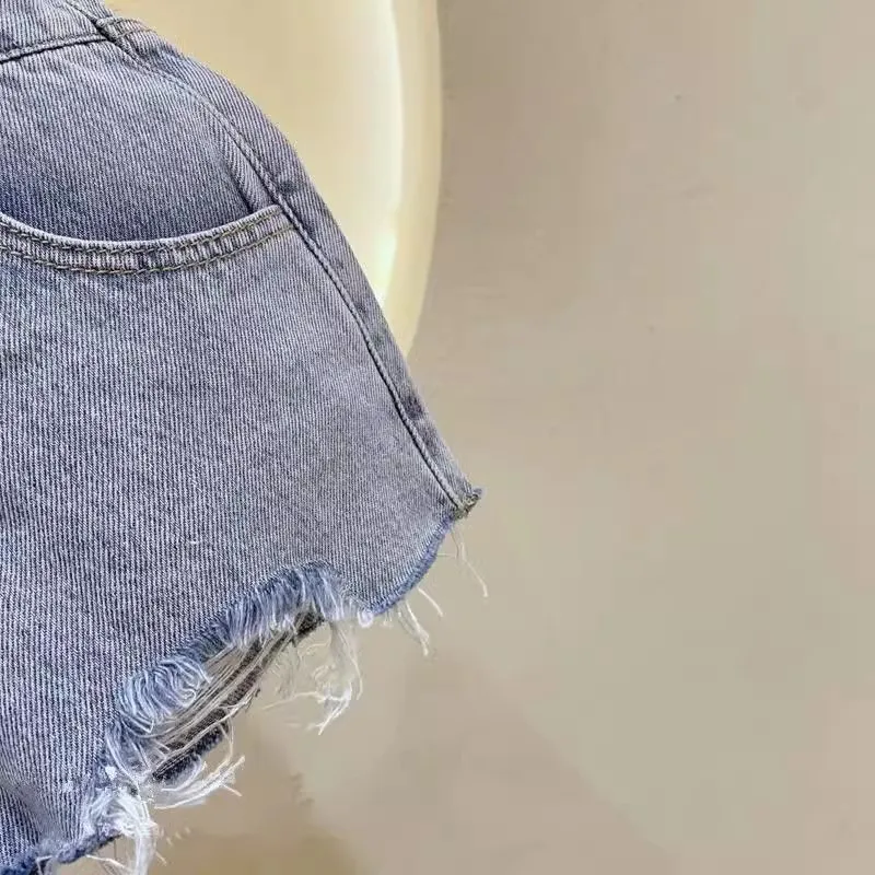 Mädchen Denim Shorts Sommer dünne Kinder zerrissene äußere Hot pants Dreiviertel weiche Hosen Kinder Shorts