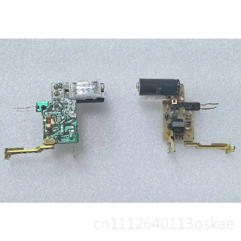 Camera flash driver circuit board with capacitor lamp flip-flop transformer