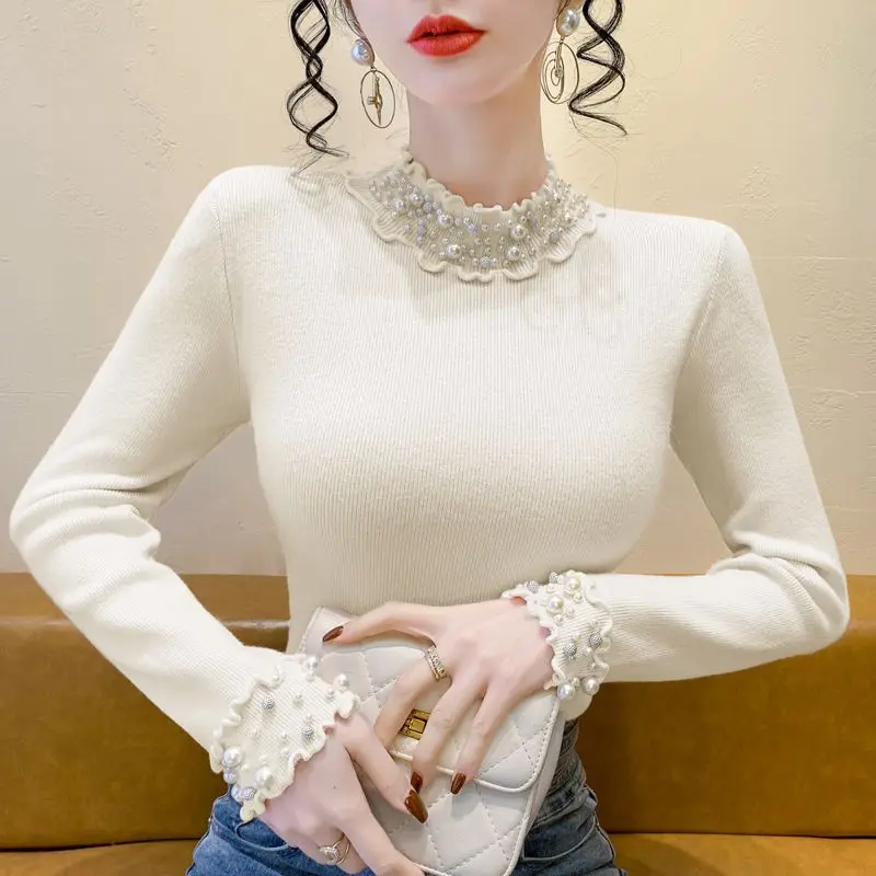 الكورية نمط شتاء جديد شبه عالية الياقة الدانتيل الصناعة الثقيلة مسمار حبة سميكة محبوك سترة المرأة أنيقة التخسيس