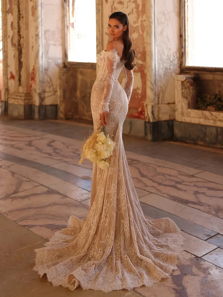 Elegante witte kanten zeemeermin avondjurken – off-shoulder bruidsjurk met lange mouwen en bloemenapplicaties voor bruidfeestgala