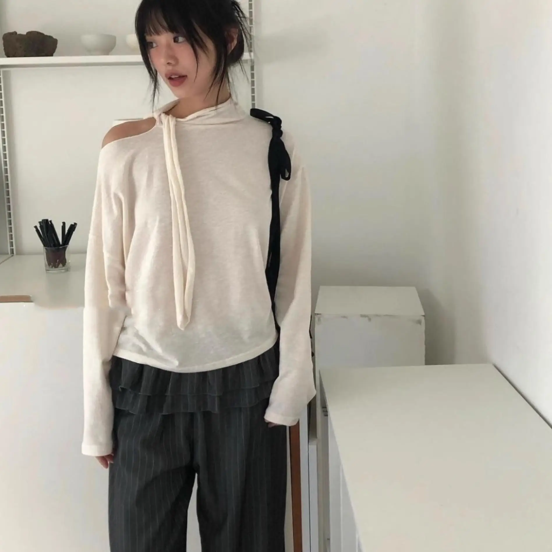 ชุดเซ็ตเสื้อท่อนบนลูกไม้ลายเค้กแบบสองชิ้นหลอกๆ สไตล์ลำลอง ดีไซน์พิเศษ ลายทาง ทรงหลวม เอวสูง ขาตรง เหมาะสำหรับใส่ไปทำงาน