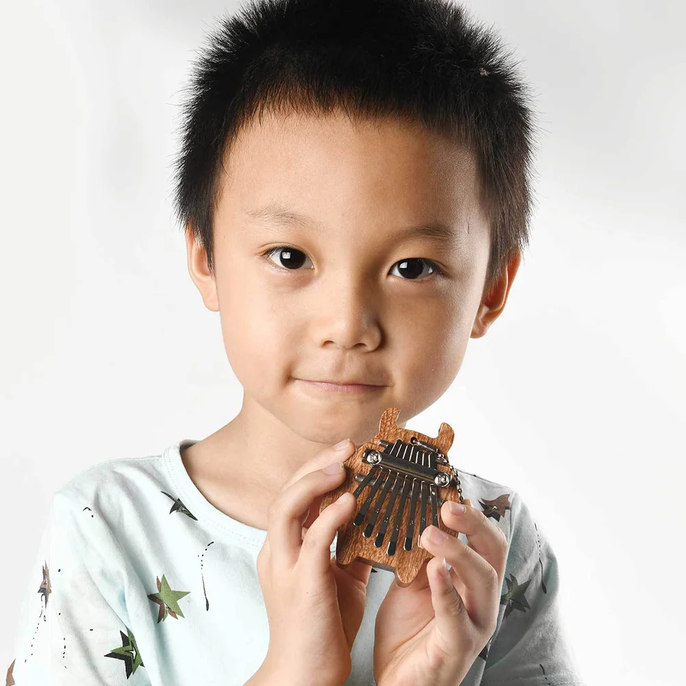 

8-Tone Wooden Kalimba Thumb Piano Hanging Rope Portable Mini Finger Piano Musical Instrument for Beginners Mini Thumb Kalimba