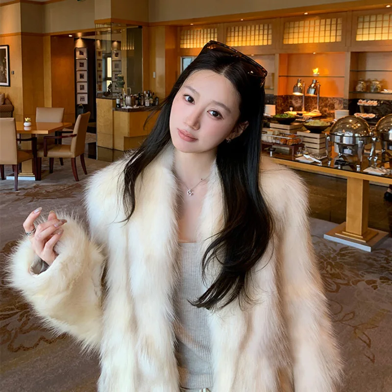 

Eco-Friendly Fur Coat Women's ort Stand Collar Young Sle Inteated Skin And Fur Warmth And Sle Winter 2025