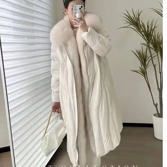 UMI MAO เสื้อแจ็คเก็ตดาวน์ยาวผู้หญิงฤดูหนาวใหม่หนาการออกแบบเฉพาะพร้อมขนสุนัขจิ้งจอกคอปกขนาดใหญ่เสื้อแจ็คเก็ตดาวน์ผู้หญิง