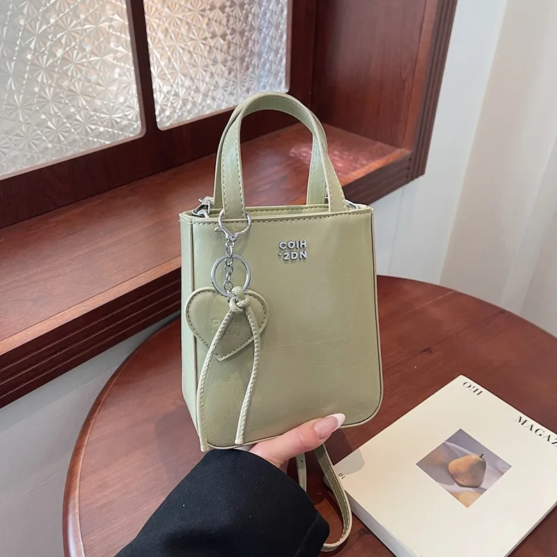 

2025 Mini Bucket Bag for Women Adjustable Crossbody Strap Shoulder Purse with Top Handle Versatile Day-to-Night Bag