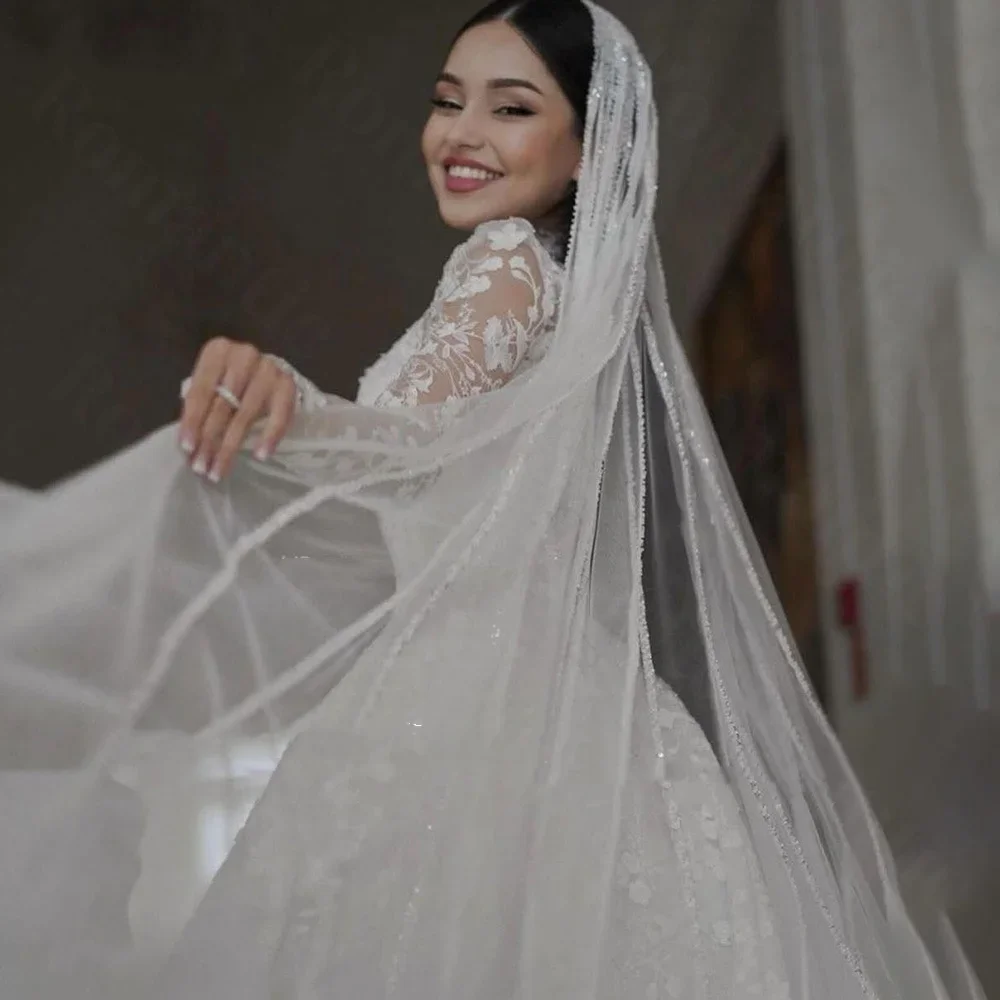 

Romantic A-Line Customized High Neck Lace Applique Wedding Dress Long Sleeves 2026 Court Train Bride Dress Vestido De Noiva
