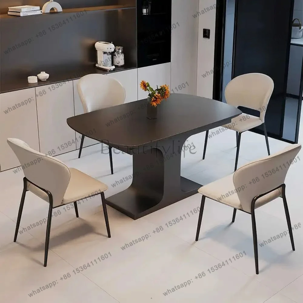 

Minimalist rock slab dining table and chair combination modern simple household rectangular dining table light luxury high sense