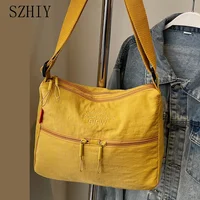 Bolso de hombro de tela lavada, bolso de viaje a la moda para mujer, bolso cruzado Diagonal impermeable con múltiples bolsillos, bolso escolar suave informal
