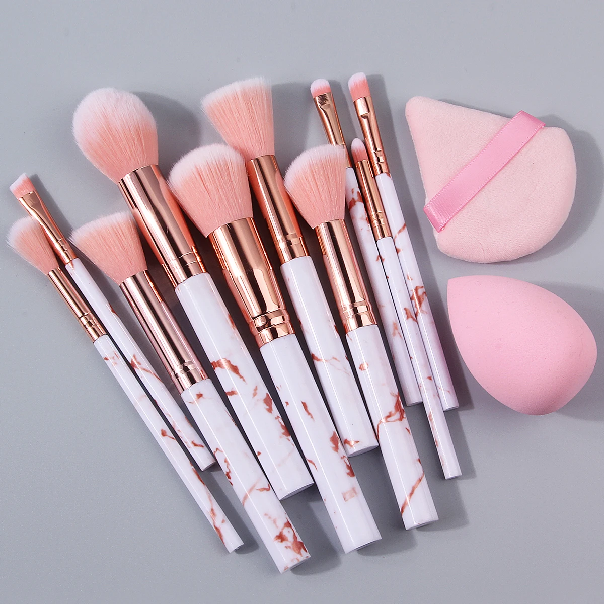 12-teiliges multifunktionales Make-up-Pinsel-Set mit rosa Marmormuster und trockenem und nassem Mehrzweck-Make-up-Schwamm-Puderquasten-Set