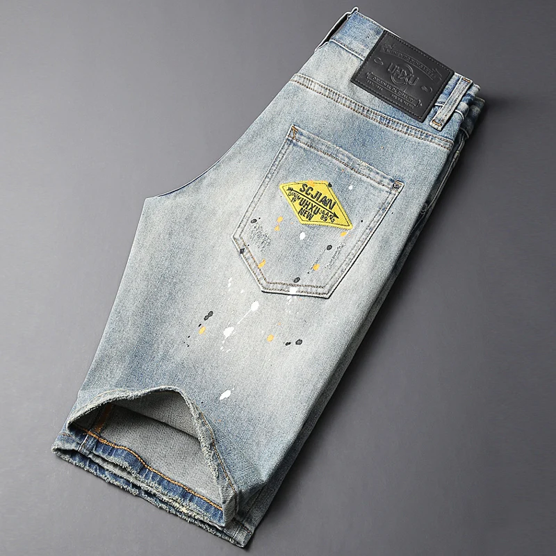 Newly Fashion Designer Men Jeans Summer Trends Retro Blue Elastic Painted Ripped Short Jeans Hip Hop Vintage Denim Shorts Men