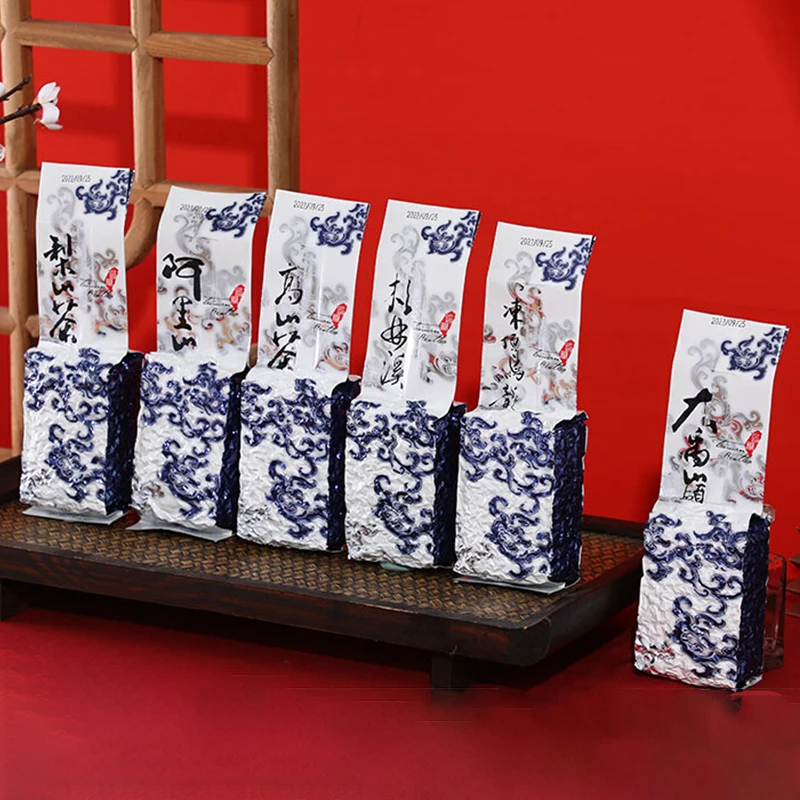 

Blue White Porcelain Pattern Taiwan Alishan Tea Bag Dongding Oolong Tie Guanyin A Variety of Oolong Tea Vacuum Aluminum Foil Bag