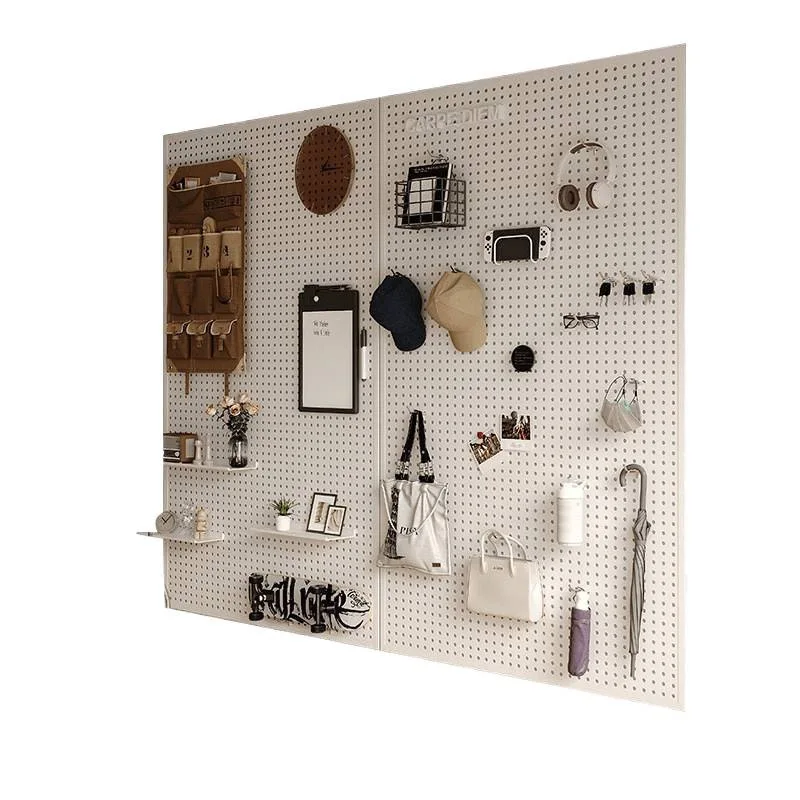 The whole wall of the living room is retracted into door hanging board, and the wall is decorated with metal punched board