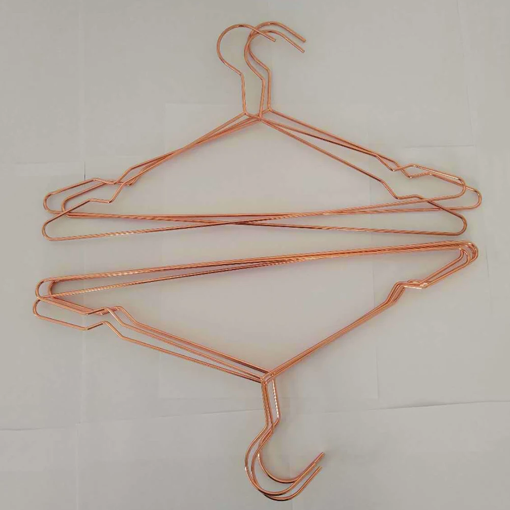 

Rose Gold Clothes Hanger Non Slip Metal Design Protects Clothes Hands Perfect For Coats Jackets Dresses Skirts Sweaters