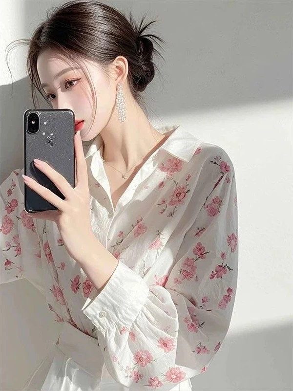 เดรสยาวพิมพ์ลายดอกไม้สีขาวสำหรับผู้หญิง แฟชั่นฤดูใบไม้ผลิใหม่ สไตล์หรูหรา ให้ความรู้สึกดี เหมาะสำหรับใส่ไปทำงาน ทรงหลวม