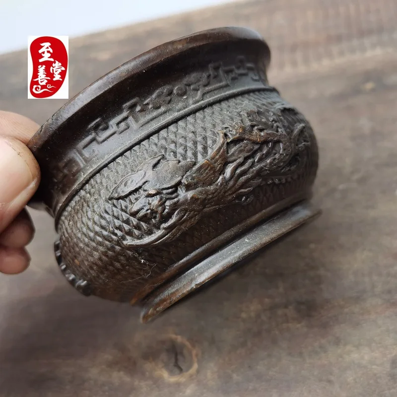 Antique-style copper incense burner with a patina effect, designed for living room decoration, featuring a dragon and phoenix mo