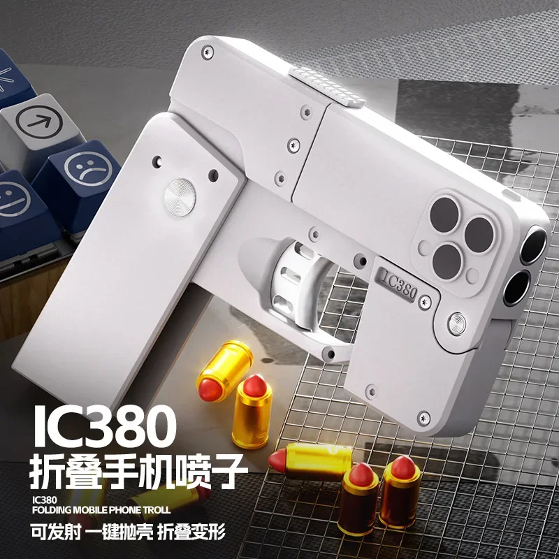 Shell Ejection Deformation Ic380 Folding Mobile Phone Spray Gun Soft Bullet Gun Can Launch Toy Pistol Model Christmas Gift 2025