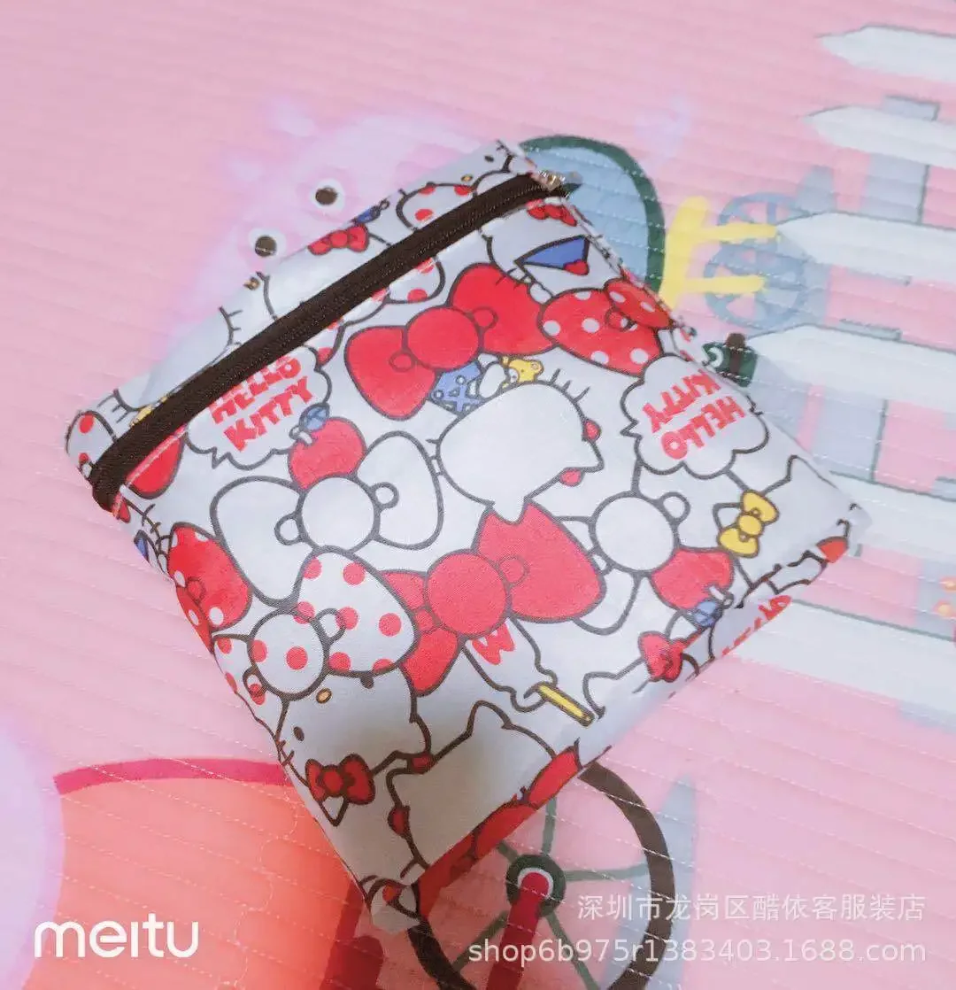 Sanrio hello kitty new handbag cartoon Melody storage bag foldable shopping bag travel bag can be fixed on the suitcase