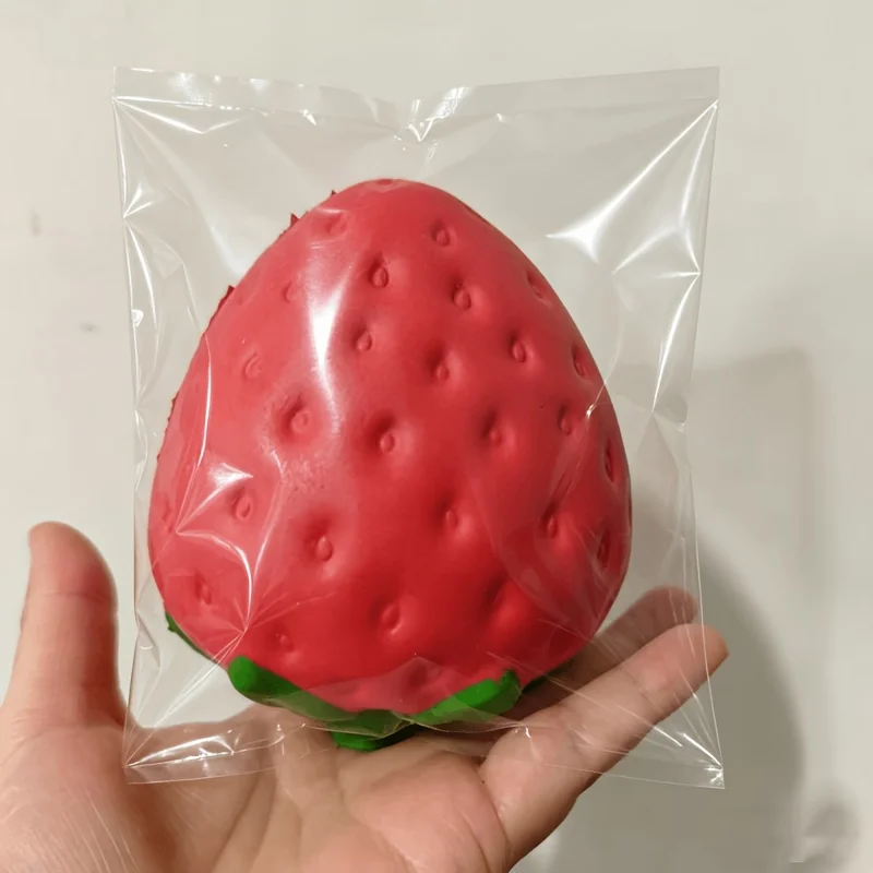 1 large strawberry pinch toy, fruit squeeze ball, foam novelty toy, slow rebound decompression sensory toy, fun gift, pinch decompression toy, sensory ball, decompression toy, pinch toy.