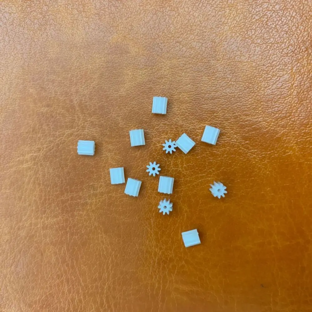 10 個 9 歯モーターギアアクセサリーホワイトプラスチックモーターエンジンギア折りたたみクアッドコプター部品