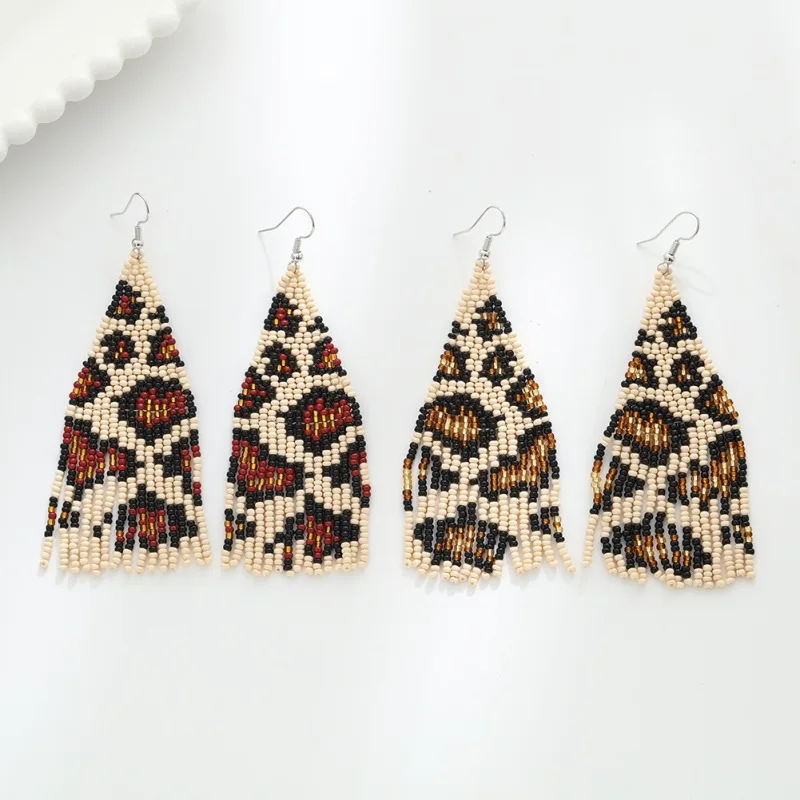 

Rice bead earrings Leopard print Design Retro Tassel Originality Hand knitting Bohemia Alloy Fashion Simple Beaded earrings