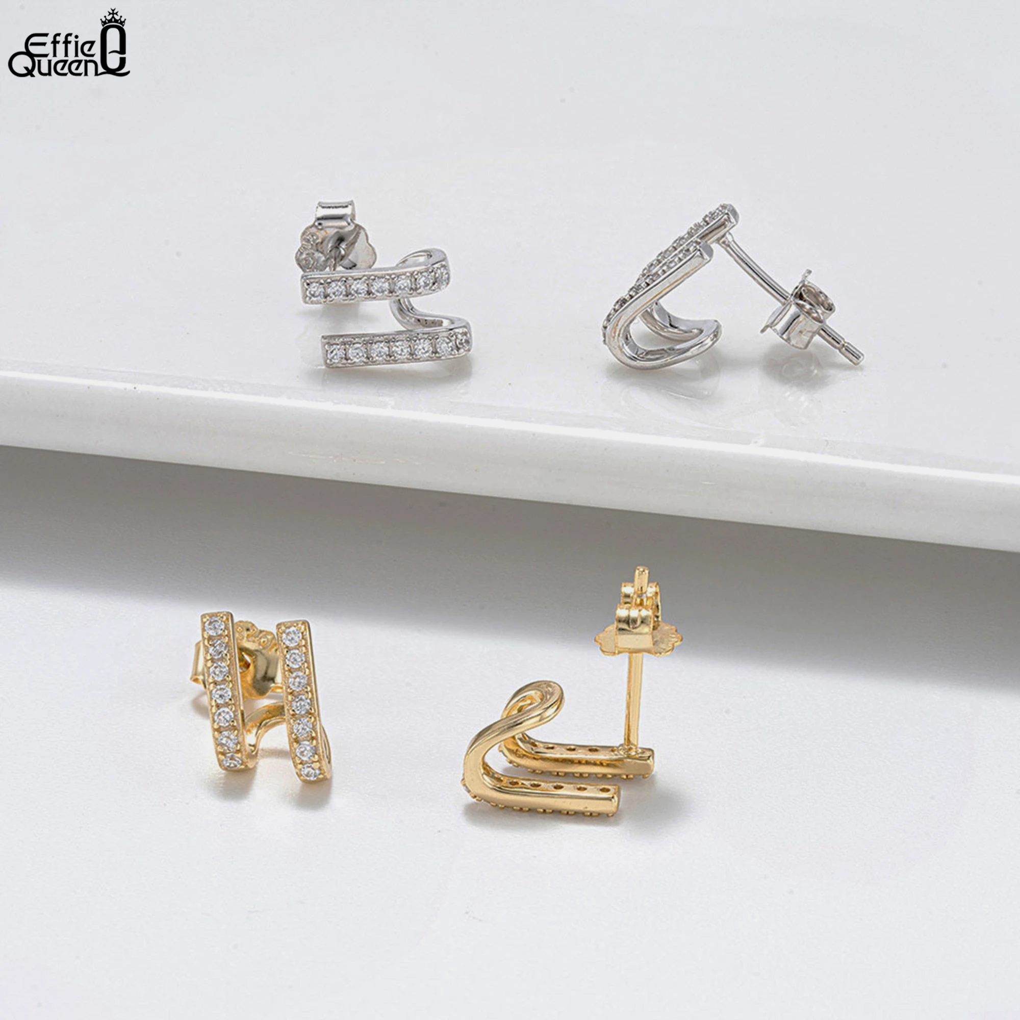 

Effie Queen 925 Sterling Silver Stud Earrings Silver With 4A Cubic Zirconia Ornament Letter Design Gift for Casual Wearing SE382