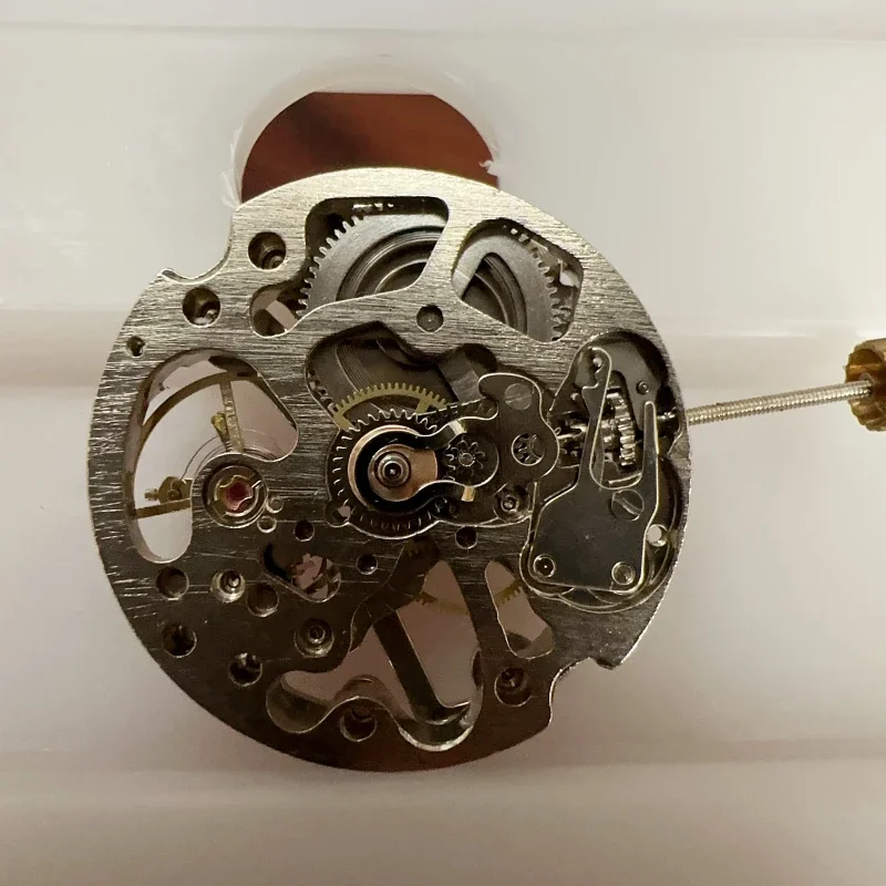 Brand new Dandong watch accessories 7120 movement hollow three-hand, semi-automatic mechanical movement hand-wound white machine