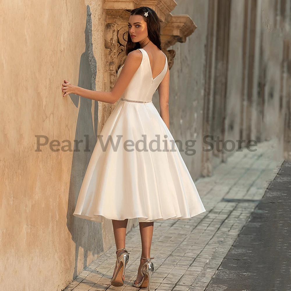 Elegante Mid-Kalb Hochzeit Kleid Vintage V Neck Sleeveless Perlen Braut Ehe Kleider mit Taschen Vestido De Novia Sommer