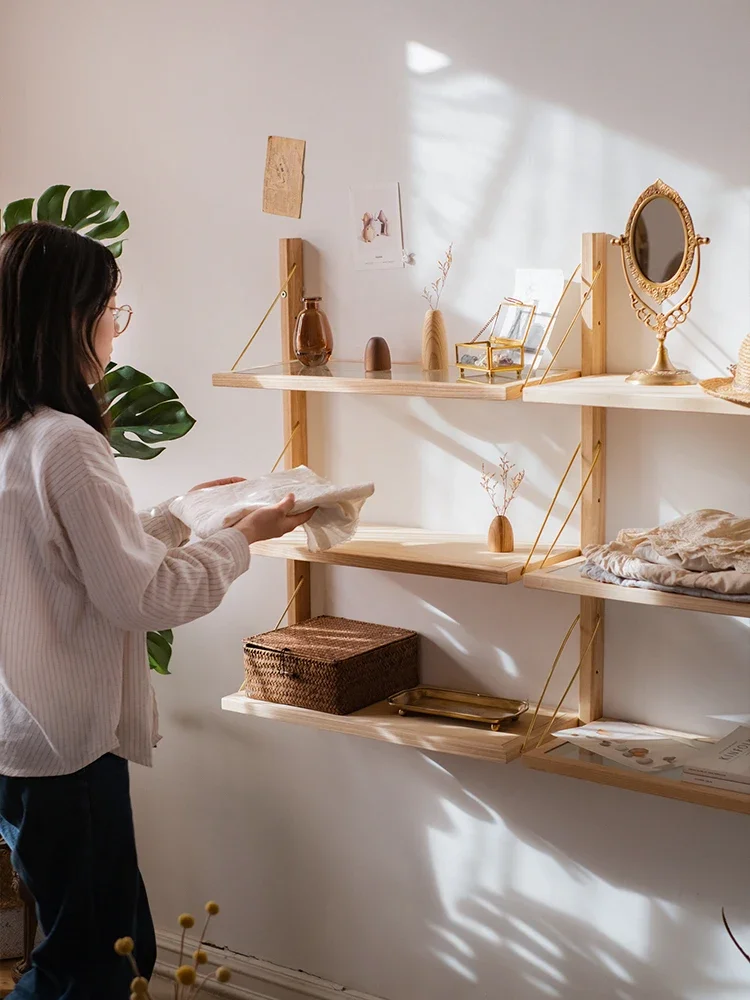 White wax solid wood wall mounted shelves, brass brackets, multi-layer bookshelves, simple straight partition, study display