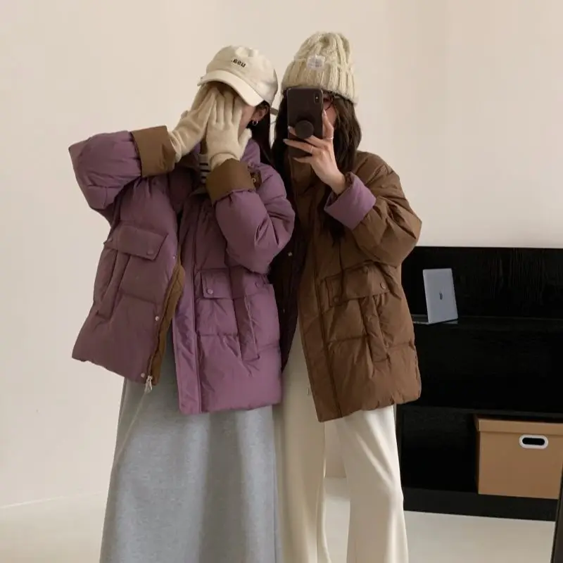 

Женский пуховик среднего и длинного цвета, новинка 2025, контрастного цвета, воротник-стойка, утолщенная и свободная зимняя куртка