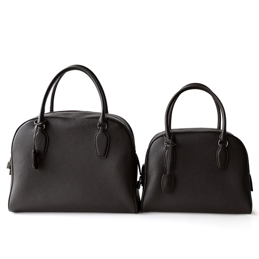 

2025 New Niche Design Light Luxury High-end First-layer Cowhide Bowling Lock Bag Commuter Shoulder Crossbody Leather Women's Bag