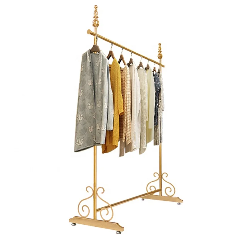 Custom. Unique European Clothing Display Racks with Rose Color