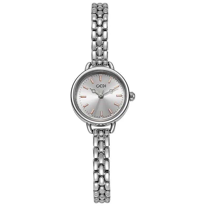 Versione coreana semplice da donna dell'orologio al quarzo impermeabile in lega con cintura fine di alto valore. Orologio da polso premium per studenti