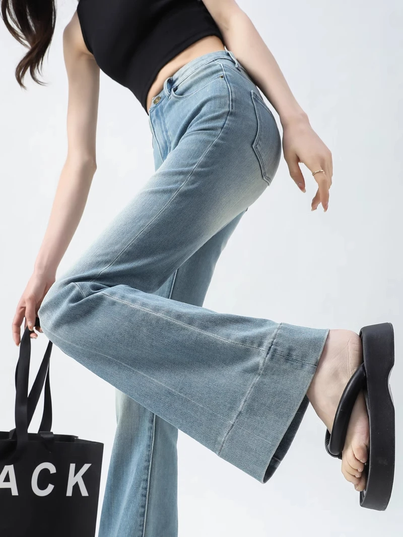 กางเกงยีนส์เอวสูงทรงบานผู้หญิง ฤดูใบไม้ผลิ ฤดูใบไม้ร่วง สีฟ้าอ่อน สไตล์อเมริกัน ขายาว ทรงเข้ารูป ช่วยให้ดูผอม