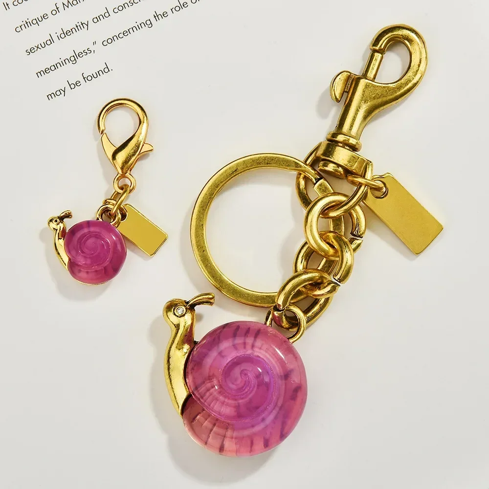 

Fashionable key chains, pendants and accessories, 2025 supports snail bag pendants