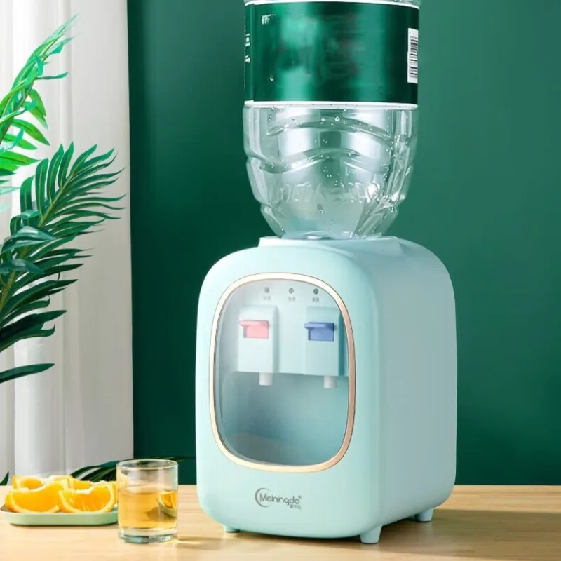 Mini countertop water dispenser for home use, hot and cold water, suitable for offices and dormitories.