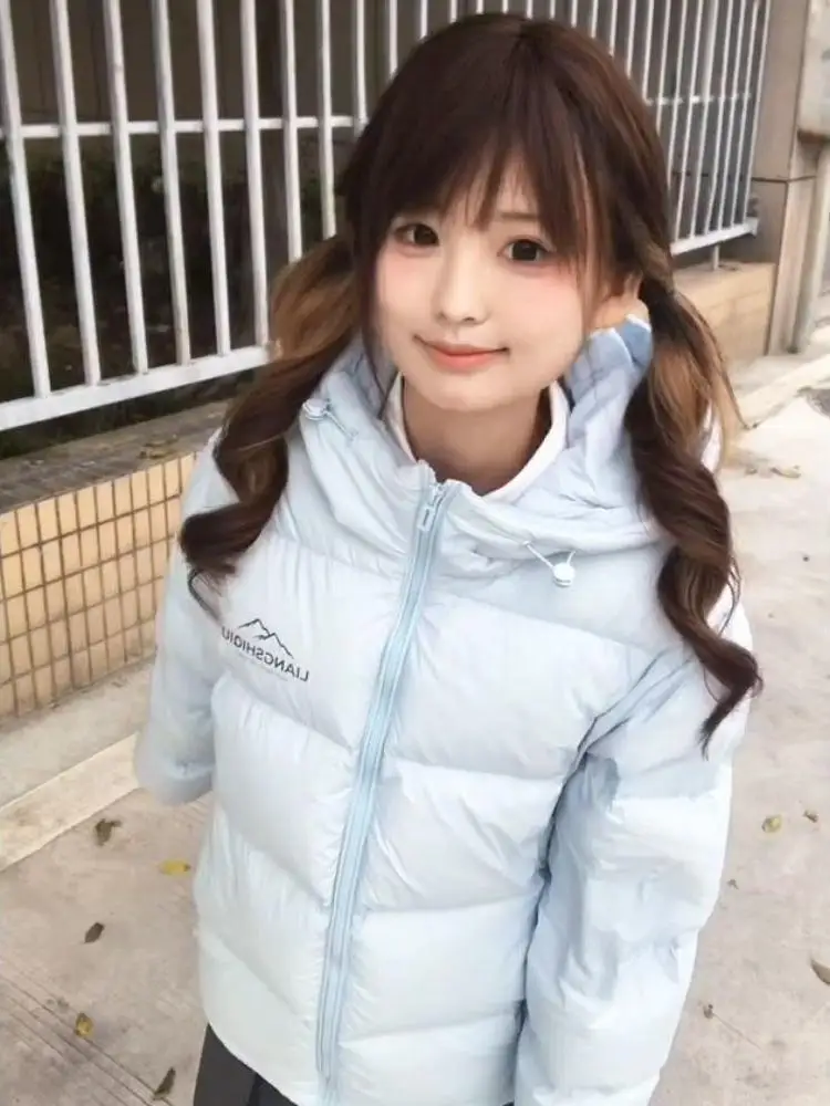Linda chica dulce tamaño pequeño reducción de edad azul claro con capucha algodón Jaet mujeres estudiantes 2025 invierno Thi abrigo de pan versátil