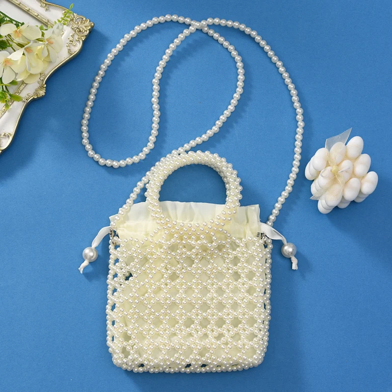 New pearl women\'s bag hand-beaded finished fashion catwalk women\'s cross-body bag light luxury texture net red mobile phone bag