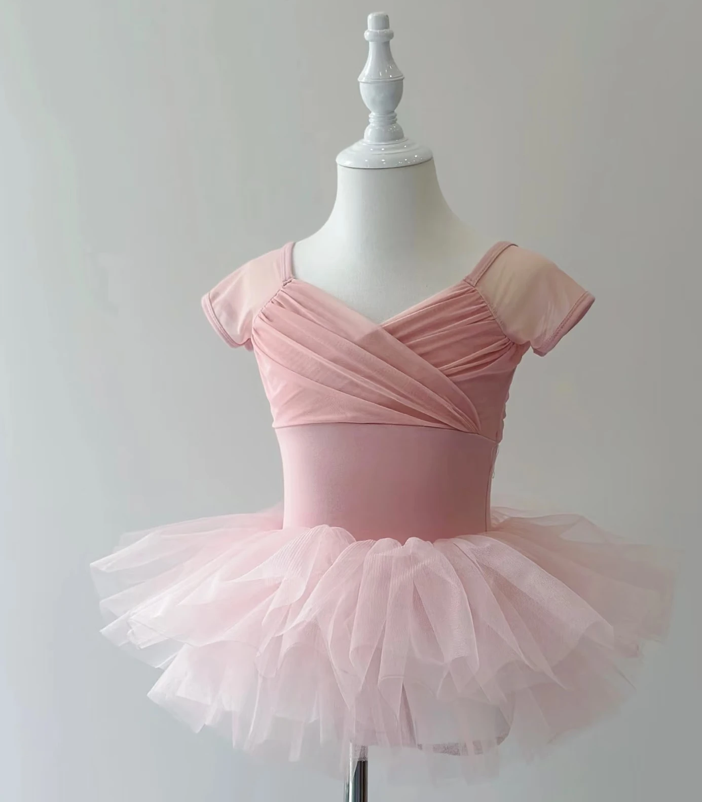 

Симпатичный балетный костюм персикового цвета, высококачественная настройка любого цвета.