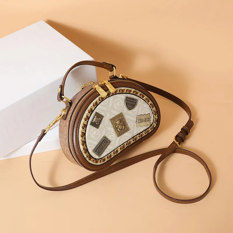 

2025 Новая женская маленькая круглая сумка в стиле ретро — высококачественная текстурированная текстура, дизайн с цепочкой, портативная для повседневного использования/подорожек