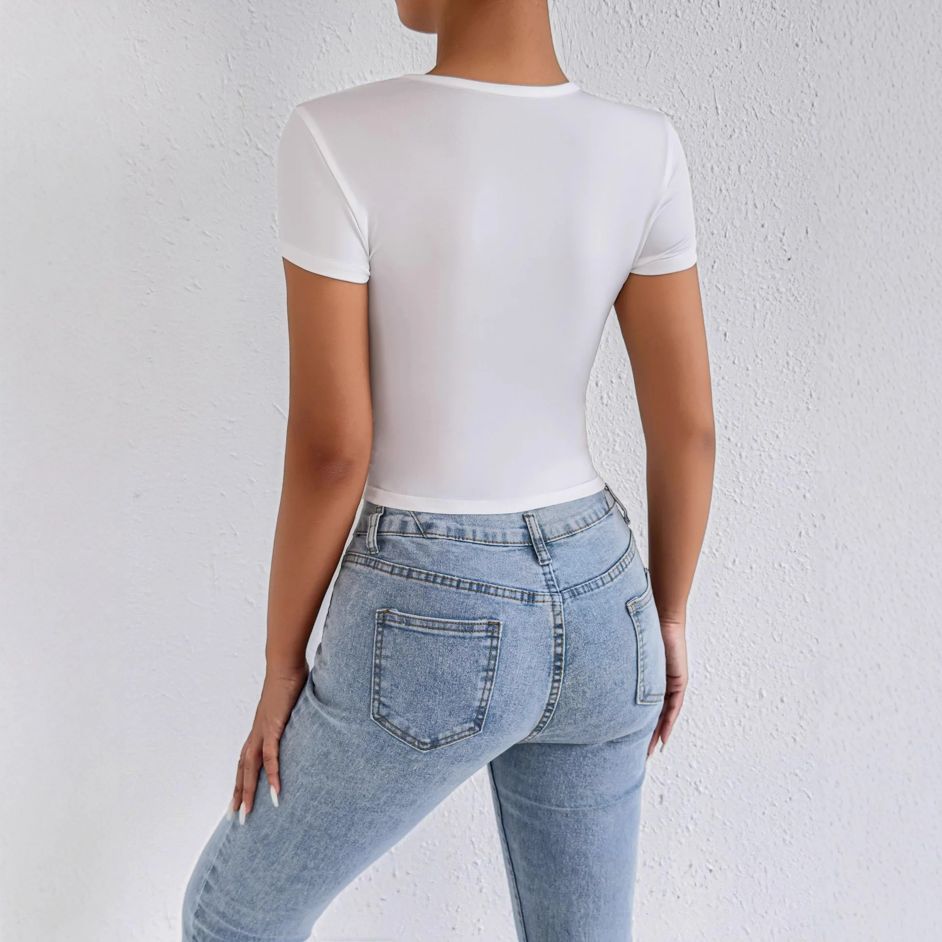 Amazon estilo europeo y americano novedad de verano Top de manga corta con cuello redondo gran oferta Top corto Sexy recortado Top para mujer