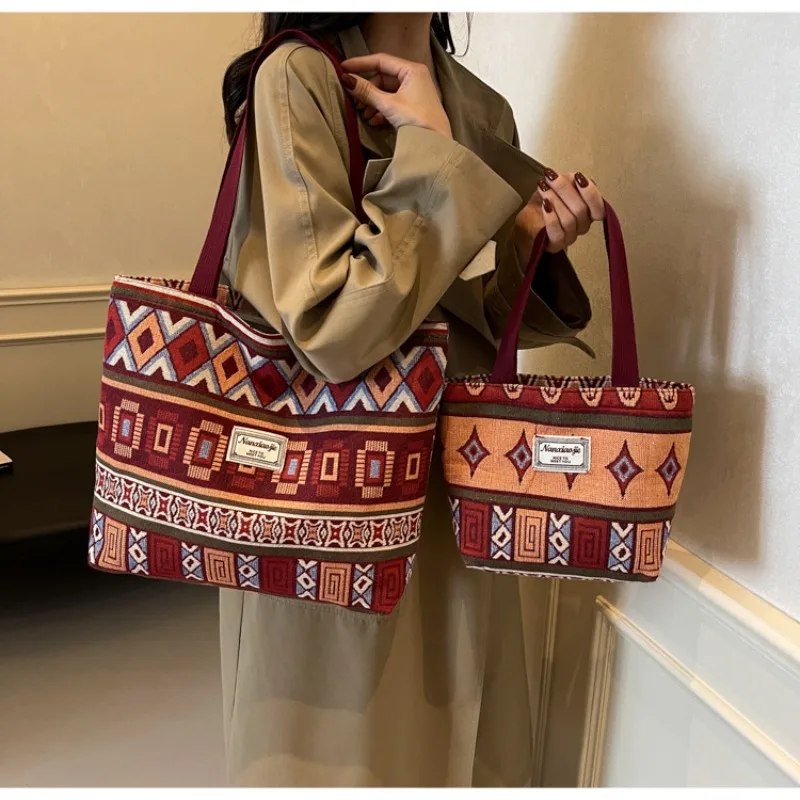 Bolso de mano de lona de gran capacidad para mujer, bolso de mano Retro versátil de un solo hombro para ir al trabajo, bolso de mano para mamá, bolso de cubo de diseñador 2025