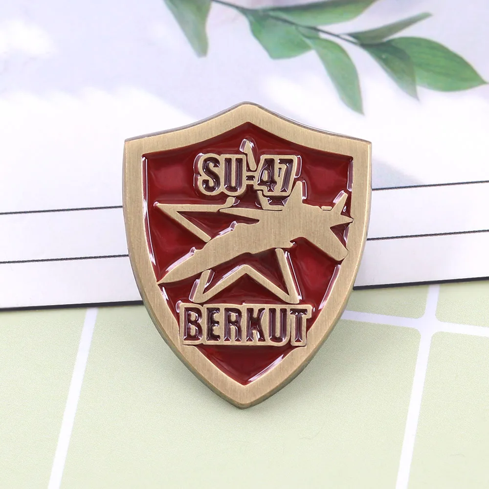 Su-47 Burke Fighter Jet Shield-Shaped Pin Vintage Military Jet Brooch Aviation Badge For Backpacks And Clothing Collectible Gift