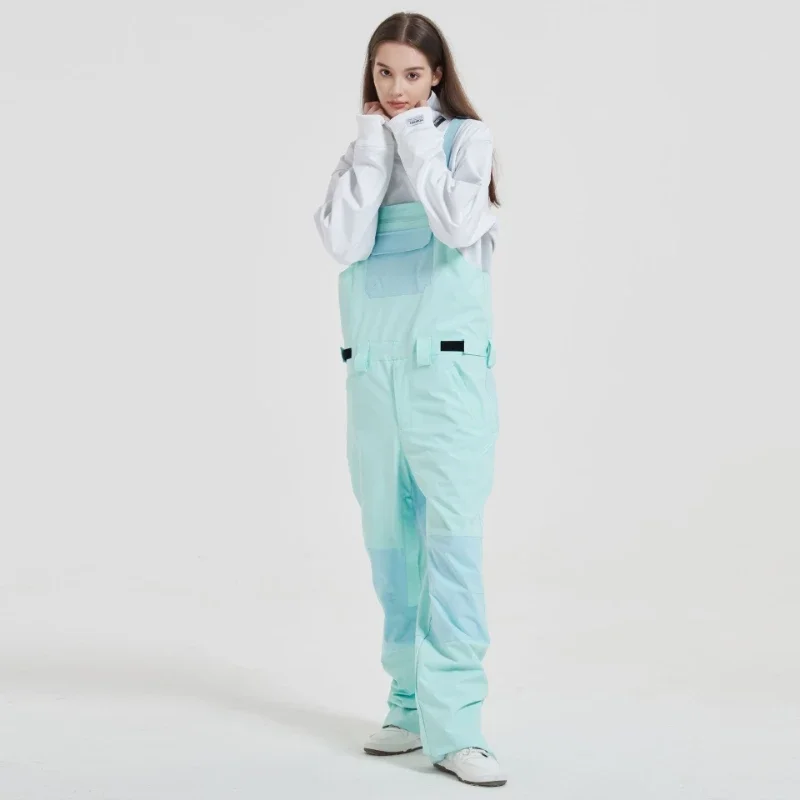 2025 sport invernali sci pantaloni di un pezzo uomo pantaloni impermeabili antivento donna tuta da sci snowboard pantaloni con cinturino all'aperto