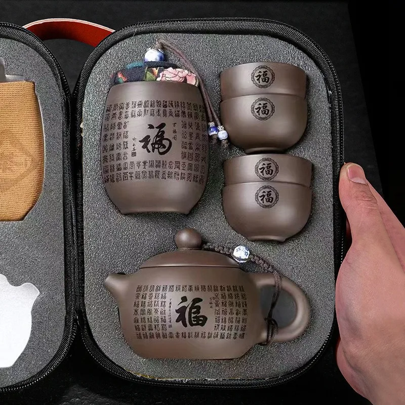New travel tea set - one pot and four cups. Quick-cooking cup. Suitable for household use. Outdoor travel portable tea cup.