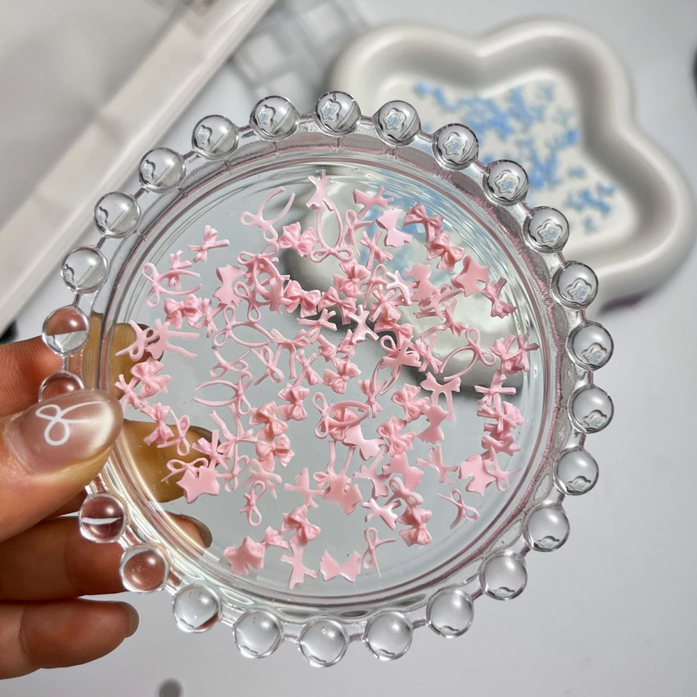 ﻿ 100 قطعة القوس الشريط الوردي مسمار الديكور ثلاثية الأبعاد الراتنج Kawaii الدانتيل Bowknot التعادل مسمار الملحقات الأبيض/الأزرق الحلو مانيكير السحر أجزاء