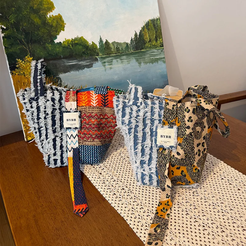 

2025 Europe and America New! Women's Splicing Denim Bag Portable Fringed Bohemian Fashion Simple Handbag